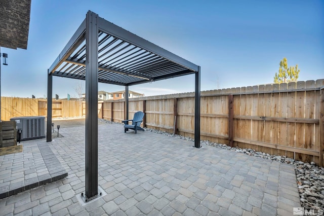 view of patio / terrace featuring a fenced backyard and a pergola