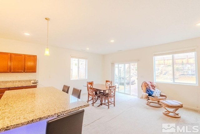 view of carpeted dining area