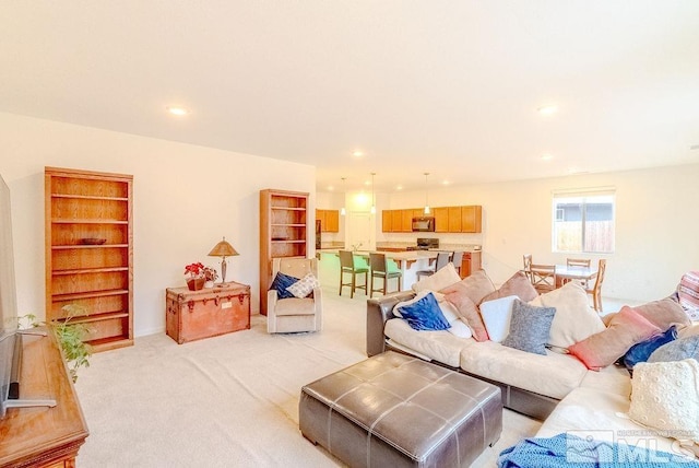 living room featuring light colored carpet