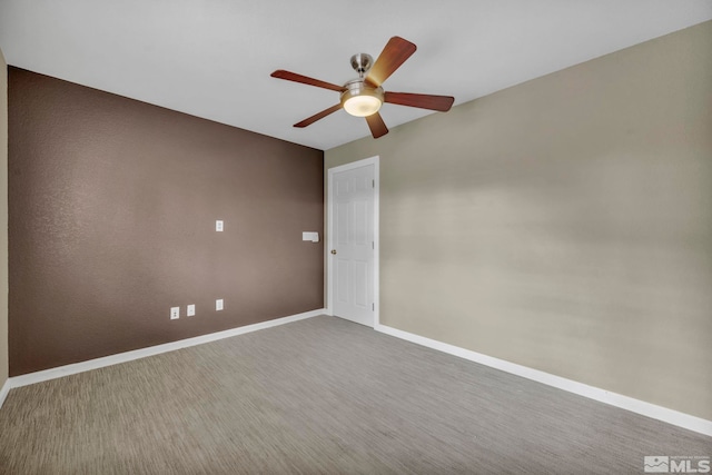 empty room with ceiling fan and hardwood / wood-style floors