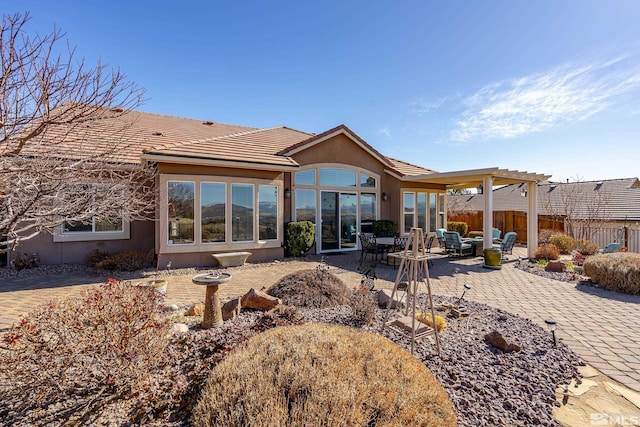 rear view of house with a patio area