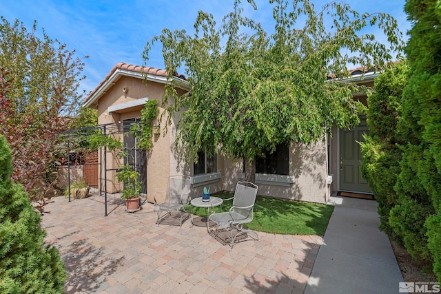 exterior space with a patio