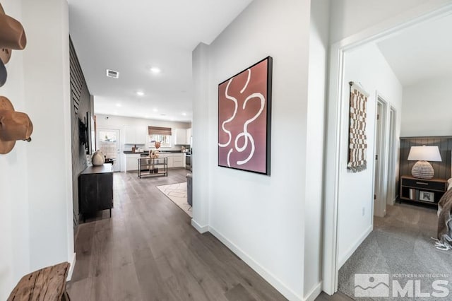 hallway featuring hardwood / wood-style flooring