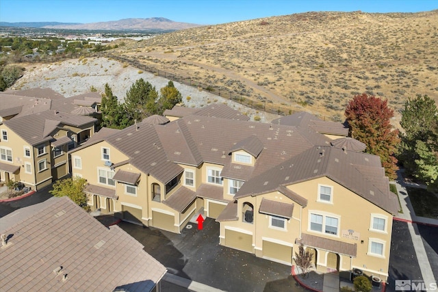 drone / aerial view featuring a mountain view