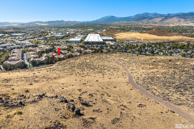 bird's eye view with a mountain view