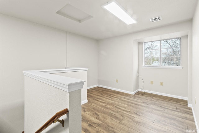 empty room with light wood-type flooring