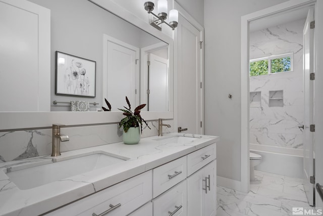 full bathroom with tiled shower / bath combo, vanity, and toilet