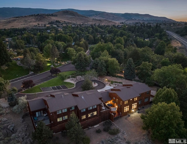 aerial view at dusk with a mountain view