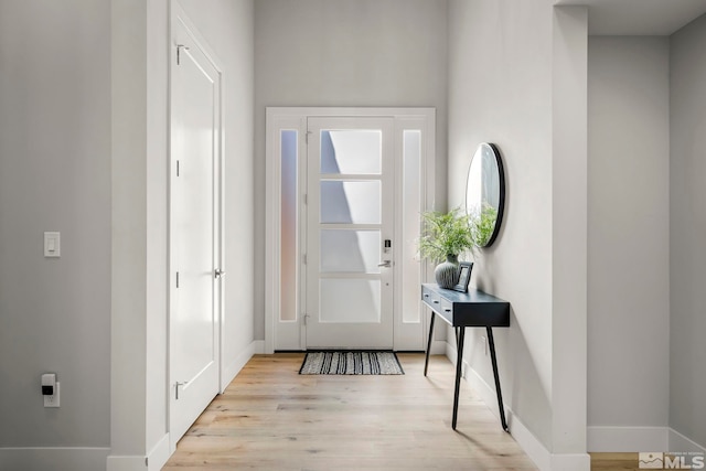 doorway featuring light wood-type flooring