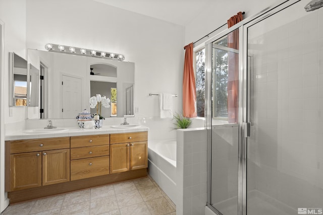 bathroom with independent shower and bath, vanity, and ceiling fan