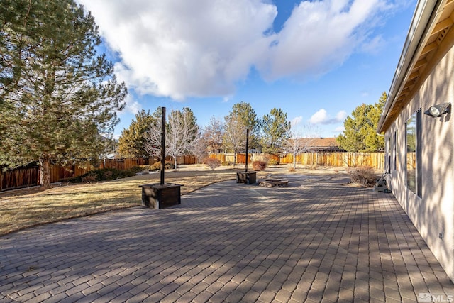 exterior space with an outdoor fire pit