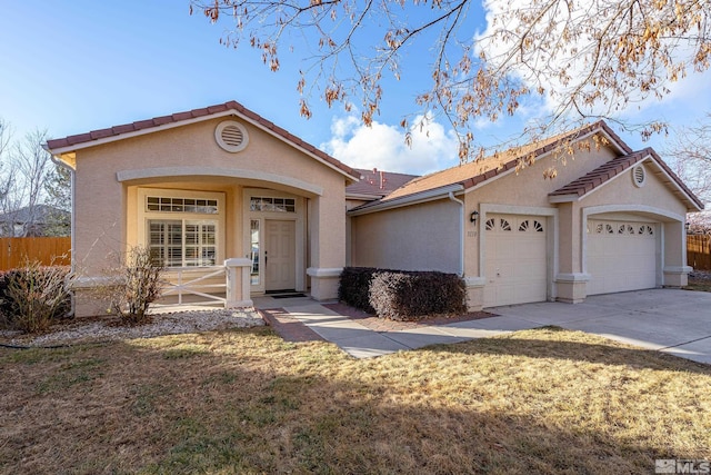 single story home with a garage