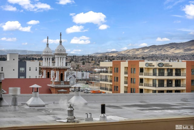 view of building exterior with a mountain view