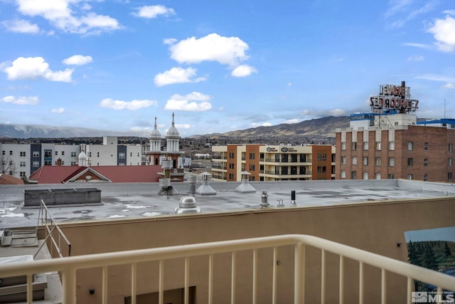 balcony featuring a mountain view