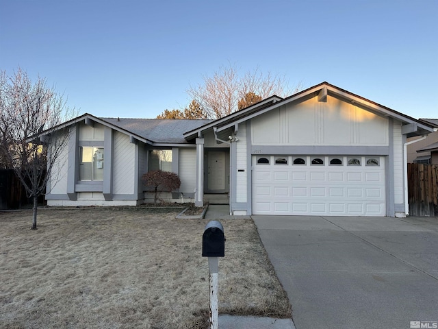 single story home featuring a garage