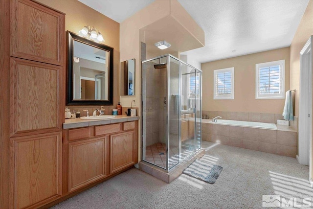 bathroom featuring vanity and plus walk in shower