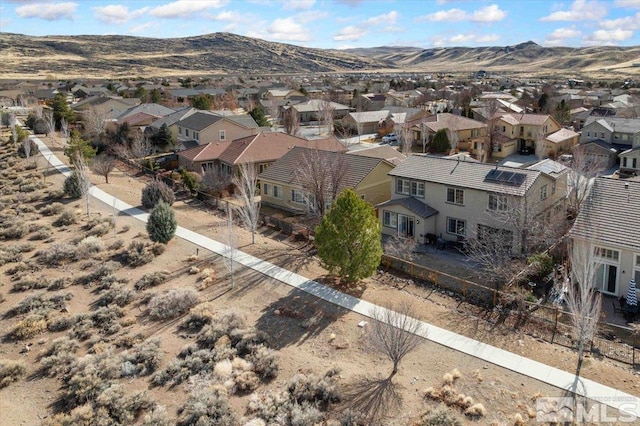 drone / aerial view featuring a mountain view