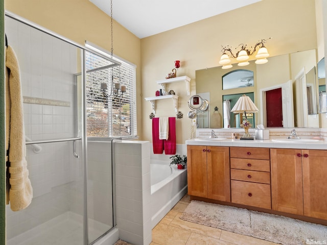 bathroom featuring vanity, tile patterned floors, and separate shower and tub