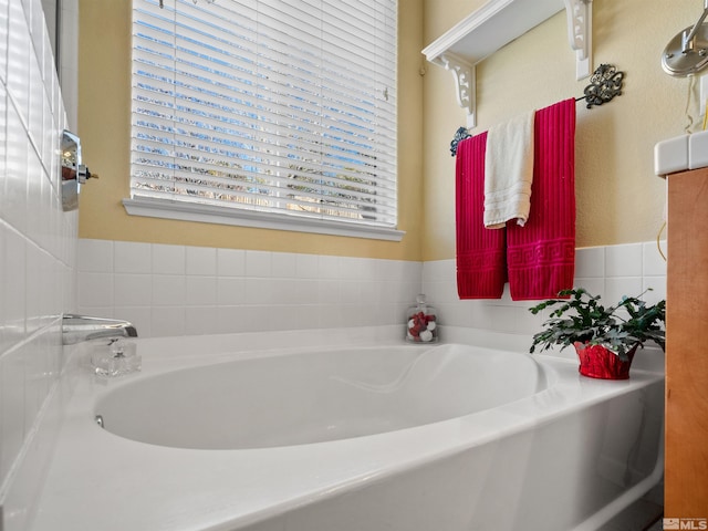 bathroom with a tub