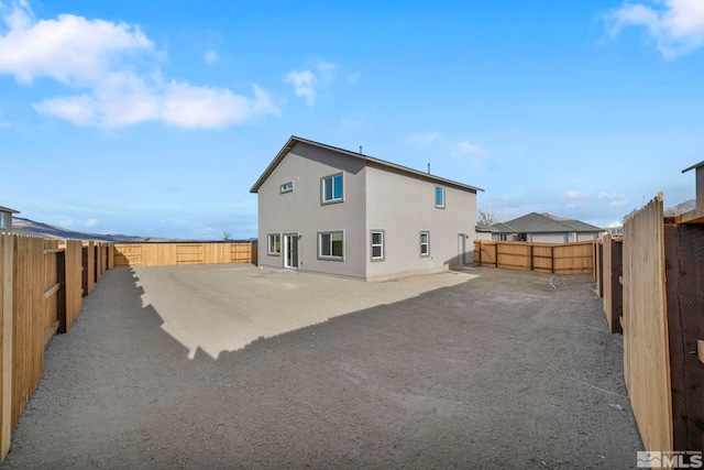 rear view of property with a patio area