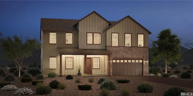 view of front of property featuring a garage