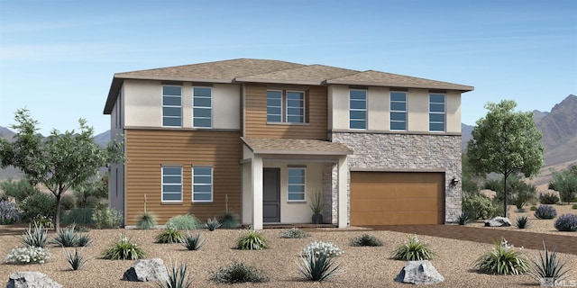 view of front of house featuring a garage and a mountain view