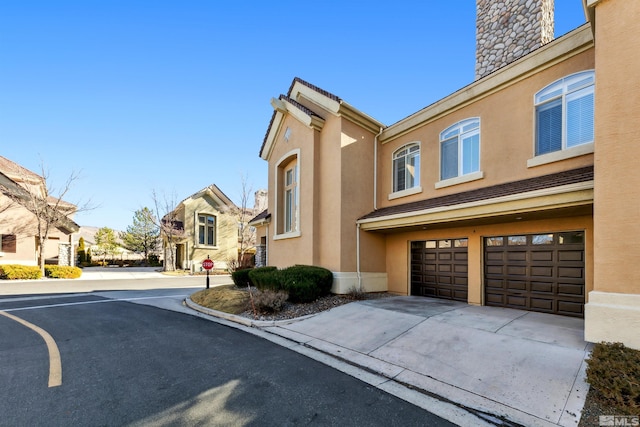 exterior space featuring a garage