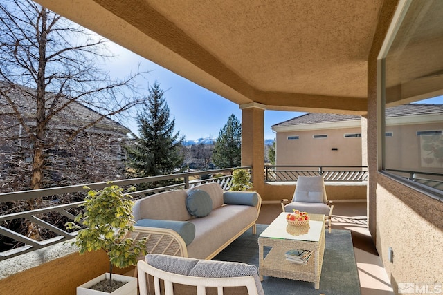 balcony with an outdoor hangout area