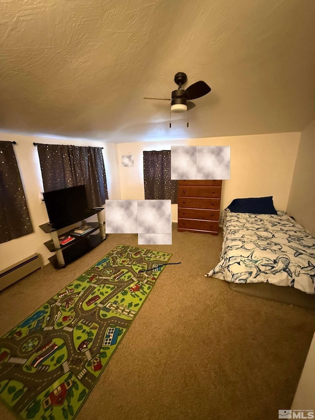 bedroom with baseboard heating, ceiling fan, and carpet floors