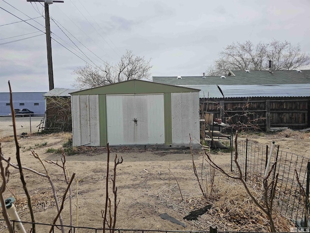 view of shed featuring a fenced backyard