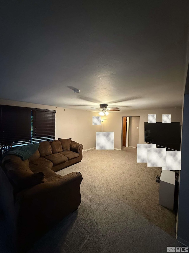 living room featuring ceiling fan and carpet floors