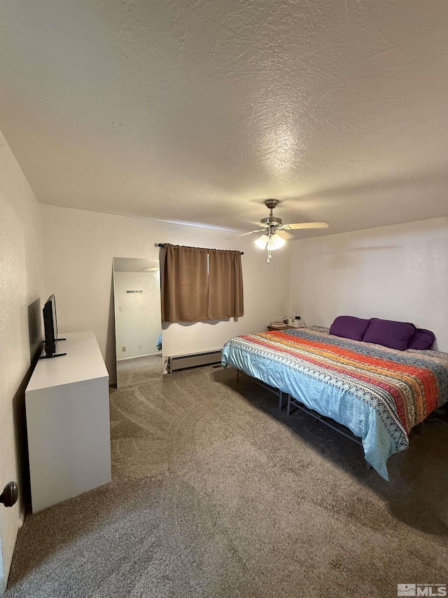 carpeted bedroom featuring a baseboard heating unit, a textured ceiling, and ceiling fan