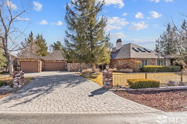 view of front of house with a garage