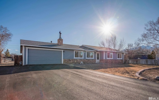 ranch-style home with a garage