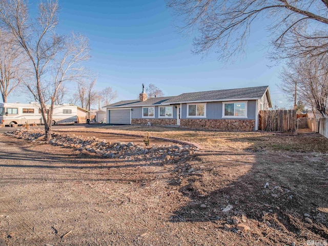 ranch-style home with a garage