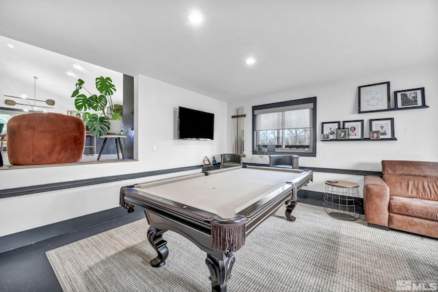 playroom featuring pool table and concrete flooring