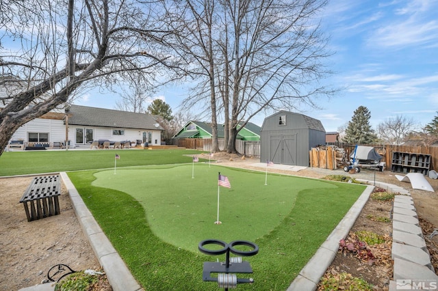 view of community with a storage shed