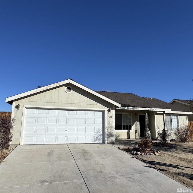 ranch-style home with a garage