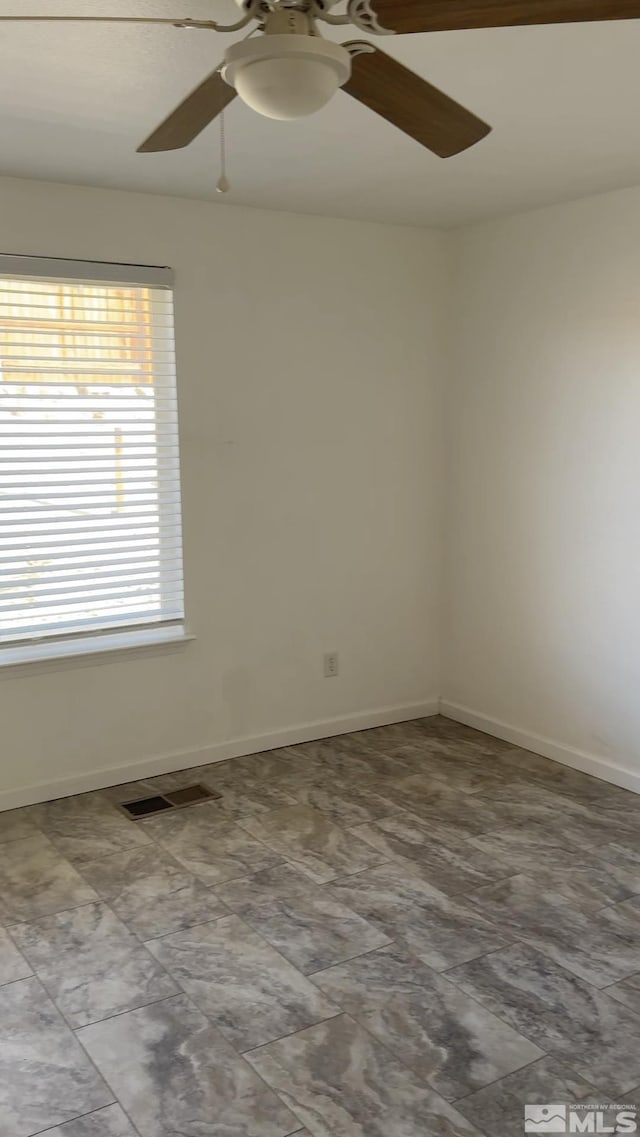 empty room with ceiling fan