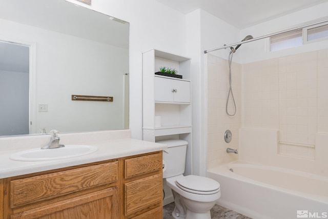 full bathroom featuring vanity, tub / shower combination, and toilet