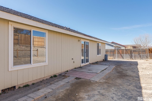 rear view of house with a patio