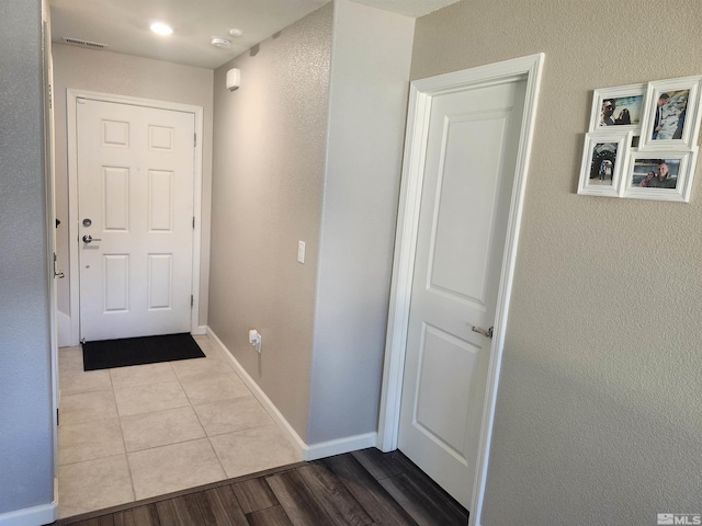 hallway featuring light hardwood / wood-style flooring