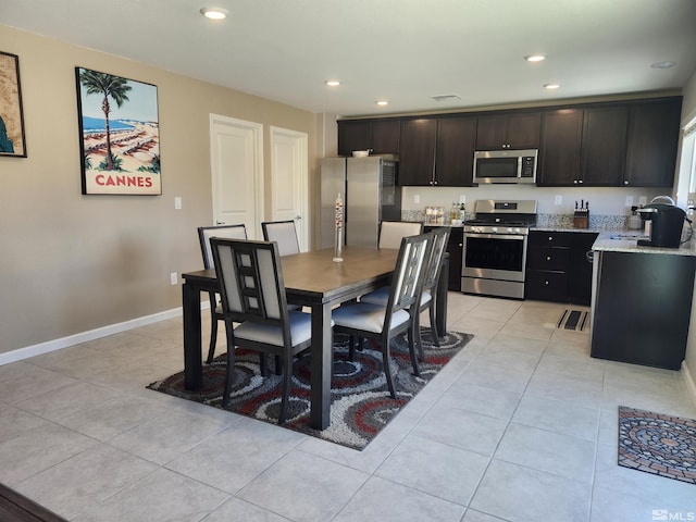 view of tiled dining space