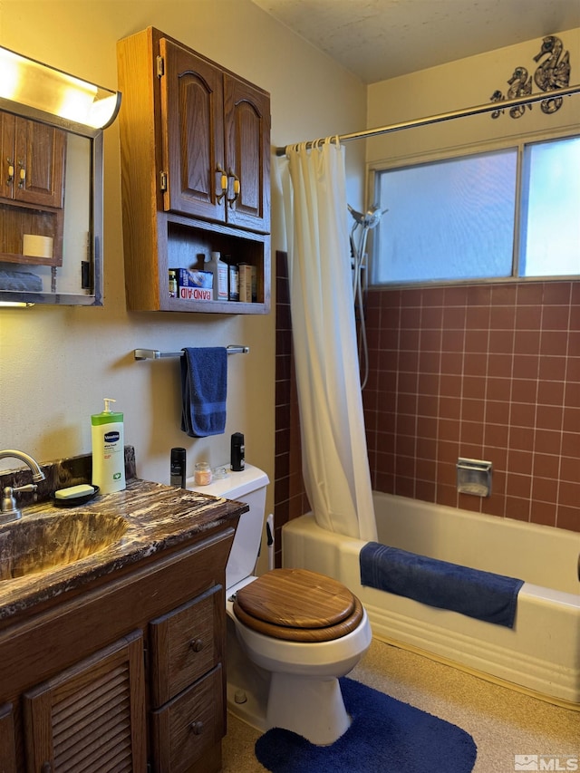 full bathroom featuring vanity, toilet, and shower / bath combo