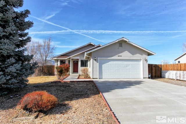 ranch-style home featuring a garage