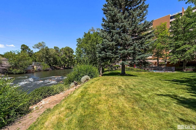 view of yard featuring a water view