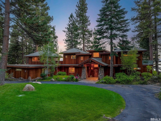 prairie-style house with a yard