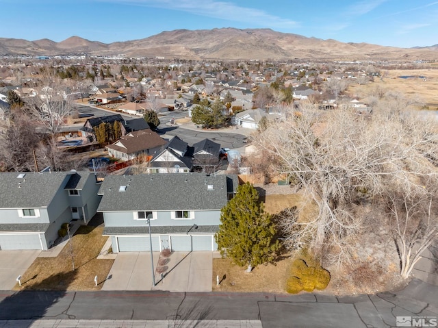 drone / aerial view featuring a mountain view