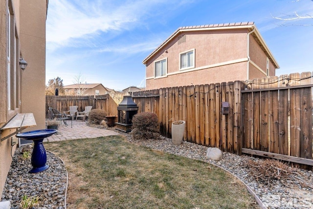 view of yard with a patio area