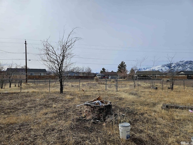 view of yard with a rural view